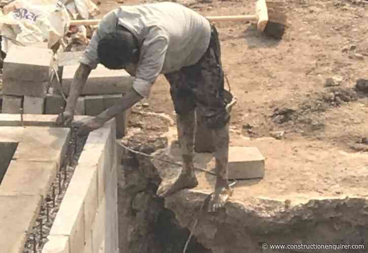 Barefoot builders found on Manchester housing site