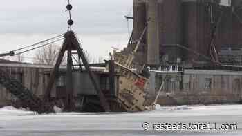Tugboat remains partially submerged in Duluth Harbor