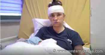 Mother Instinctually Protects Baby as Shrapnel Hits Them During Kyiv Missile Strike
