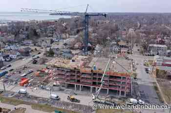 Photo: Pouring cement at Port Colborne condo site - Welland Tribune