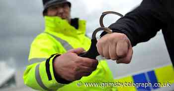Man arrested after threatening shop worker with hammer - Grimsby Live