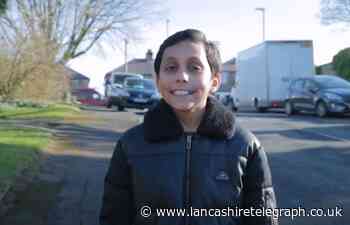 Schoolboy knocks on car windows asking people to switch engines off