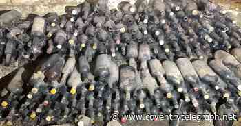 Hundreds of alcohol bottles found under Coventry shop after 70 years - Coventry Live