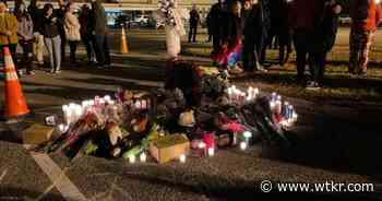 Mourning community holds vigil for Newport News high school football player killed in shooting - News 3 WTKR Norfolk