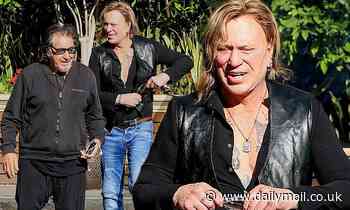 Mickey Rourke flashes his chest tattoos as he towers over pal Al Pacino during lunch - Daily Mail