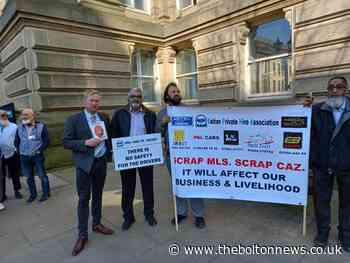 Bolton Taxi drivers launch fresh protest against minimum licensing standards - The Bolton News