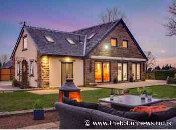 This masterpiece of an Ainsworth home is great for horse-lovers with its own paddock