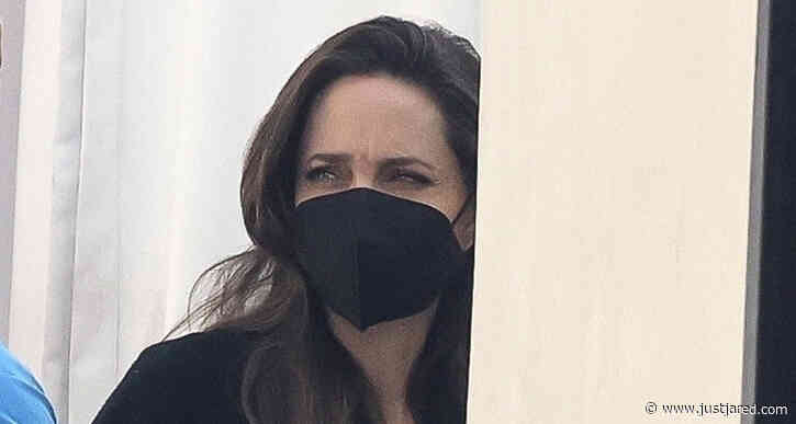 Angelina Jolie Sports Long Black Coat for Day Out in Los Feliz