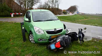 Scooter onder auto in Oud-Sabbinge, één gewonde - HVZeeland.nl
