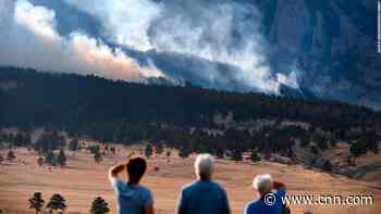 Evacuation orders for 8,000 homes are lifted after a wildfire torches parts of the Boulder area