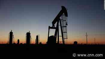 Oil prices fall sharply, briefly dipping below $100 a barrel