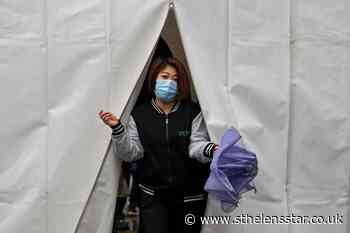 Shanghai's two-phase lockdown tests 'zero-Covid' limits - St Helens Star