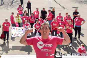 Walkers cheered through St Helens for World Down's Syndrome Day - St Helens Star