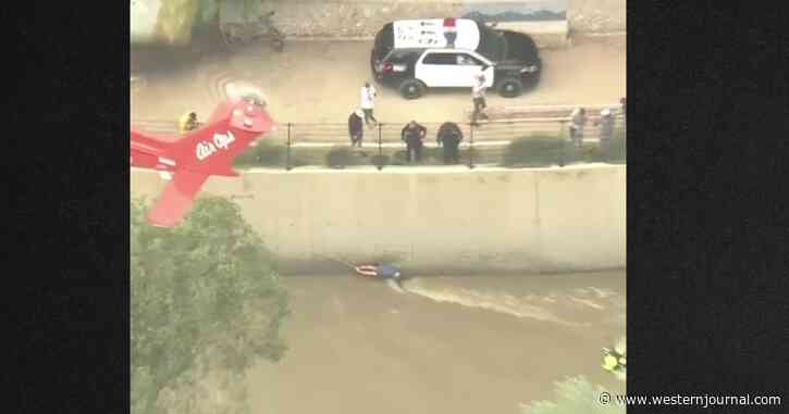 After Hazardous River Rescue of Dog, Man and Woman, Fire Department Issues PSA: 'Please. Stay. Out.'