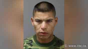 Fugitive accused of pointing gun at Saskatoon police arrested, treated for bullet wound