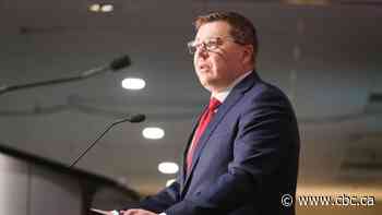 Premier moved during meeting with Ukrainian refugees as he ends overseas trade mission