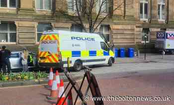 Police search and seize car in Bolton town centre