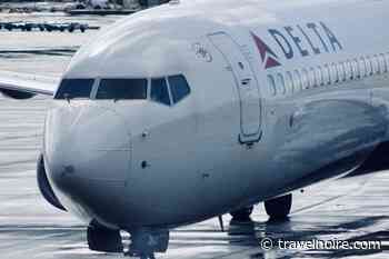 Delta Passenger Kicked Off Flight For 'Offensive' Sweater Now Planning To Sue The Airline - Travel Noire