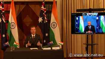 Australia and India sign 'historic' trade deal after more than a decade of negotiations