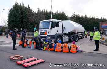 Dozens of climate change protesters arrested after 10 oil terminals blocked