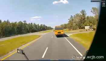 Dash camera video shows a semi-truck crash into a school bus in Levy County - WCJB