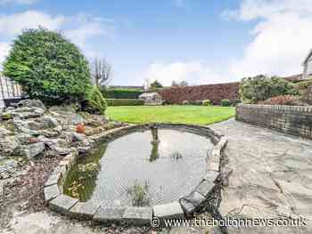 Lovely rockeries, pond and vast gardens add charm to this stunning Bolton home - The Bolton News