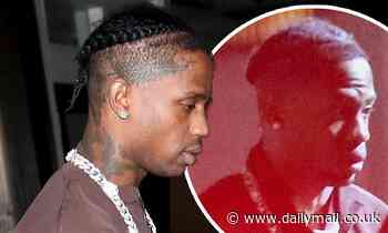 Travis Scott brings the bling in silver chain with circular pendant as he leaves a party in LA - Daily Mail