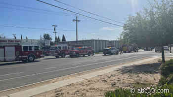 Crews battling 2-alarm apartment fire in central Fresno