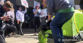 Housing advocates march through Regina demanding increase to social assistance rates