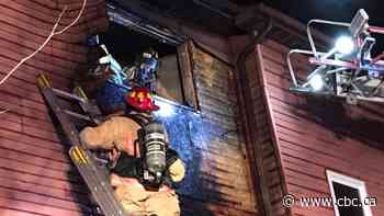 Hamilton firefighters rescue family of 7 from burning townhouse on the Mountain - CBC.ca