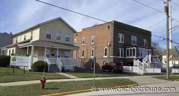 Old hotel near Fox River in downtown Aurora for sale - Chicago Tribune