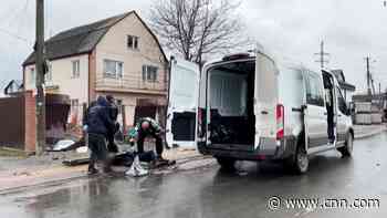 Aftermath in Bucha, Ukraine, shows civilian bodies lying in the streets