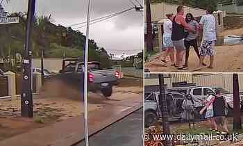 Carnavon dash cam: Woman charged after ploughing car into family home, appears to flee - Daily Mail