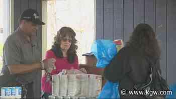 One month after deadly shooting at Dawson Park, volunteers return to feed those in need - KGW.com