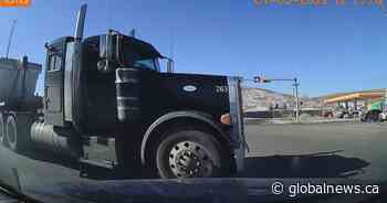 Calgary woman grateful to only have suffered minor injuries after her car was hit by gravel truck