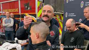 Coon Rapids firefighters shave heads in support of one of their own