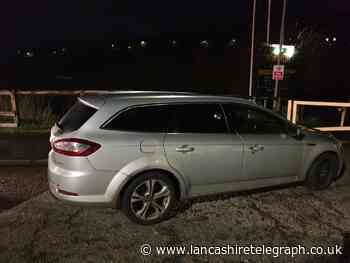 Stolen car with false plates pulled over by police in Haslingden