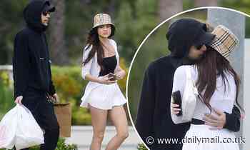 Scott Disick's latest flame Holly Scarfone shares hug with male pal - Daily Mail