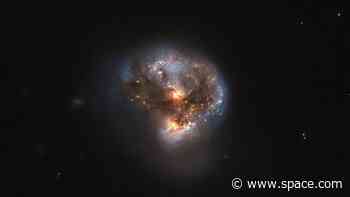 Pew, pew! Scientists detect record-breaking 'megamaser' 5 billion light-years away.