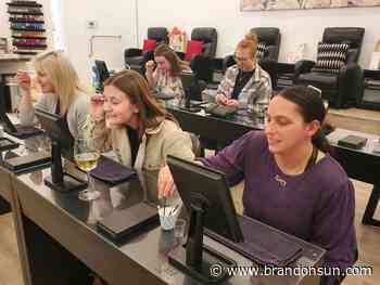 Spa gives back by pampering daycare staff - The Brandon Sun