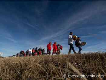 Families of Megan Gallagher and Ashley Morin walk together to raise MMIWG2S awareness