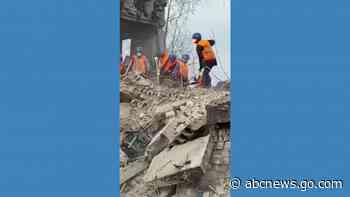 WATCH:  Volunteers help Ukrainian emergency officials clean Borodyanka