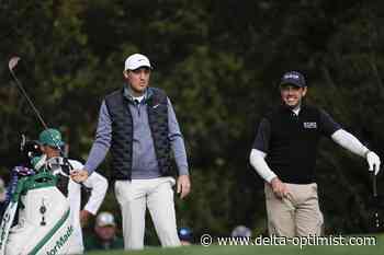 Scheffler survives wild, windy cold day to lead Masters by 3 - Delta Optimist