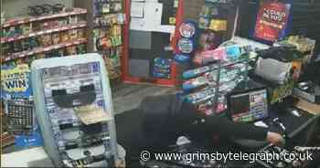 Robber with huge knife terrifies shopkeeper with threats to 'slice' him - Grimsby Live