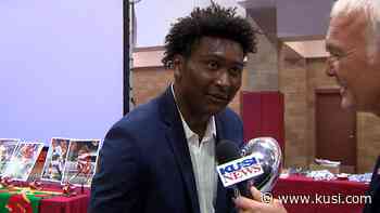 2021 Silver Pigskin Winner Lucky Sutton receives trophy - - KUSI