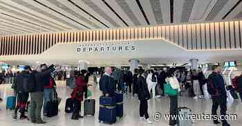 Airport delays will hit aviation recovery, UK regulator warns - Reuters