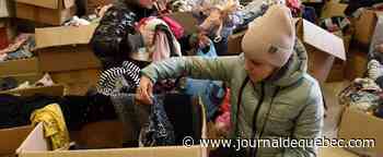 Loin de chez eux, des déplacés ukrainiens à la recherche de vêtements