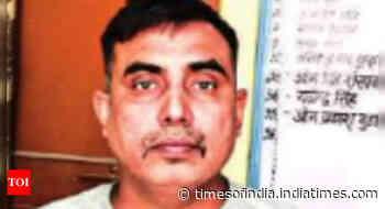 Arrested transport officer & aides fleeced truckers of over 200 daily - Times of India