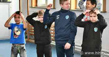 “Letterlijk met handen en voeten”: Oekraïense kinderen leren Nederlands tijdens Babbelkamp - Het Laatste Nieuws