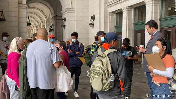 Migrants bused to DC as part of Texas Gov. Abbott's protest against Biden - CNN